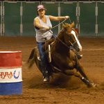 Meghan and rooster barrel racing